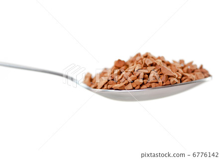 Spoon with chocolate powder Spoon with chocolate powder 6776142