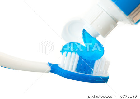 Close up of toothpaste on a toothbrush Close up of toothpaste on a toothbrush 6776159