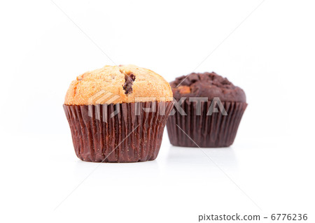 Two fresh baked muffins 6776236