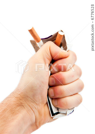 Hand crushing a cigarette pack 6776528