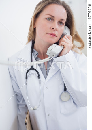 Doctor holding a phone 6776966