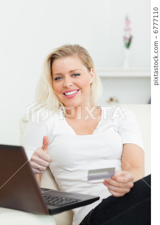 Casual woman buying on internet Casual woman buying on internet 6777110