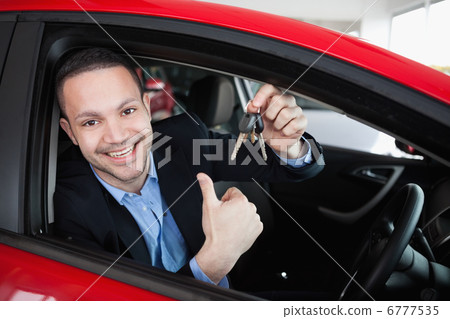 Happy man holding car keys 6777535