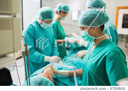 View of a nurse holding an oxygen mask 6780608