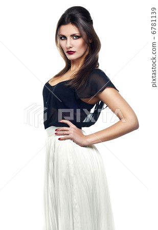slim woman in white skirt and black top slim woman in white skirt and black top 6781139