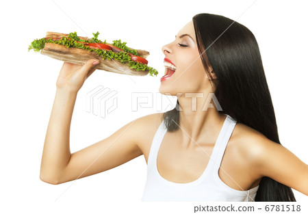 hungry woman biting long sandwich 6781518