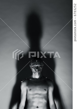 Grey Covered Pensive Man in lights and Shadows. Fantasy & Mystery Grey Covered Pensive Man in lights and Shadows. Fantasy & Mystery 6783252