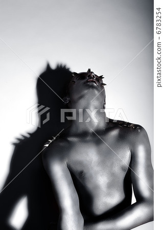 Expressive Emotions. Drama. Silver-plated Man posing. Creativity 6783254