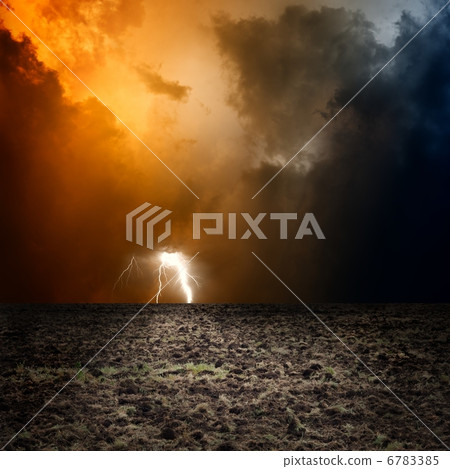 Arable field, dark sky 6783385