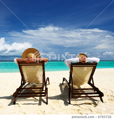 Couple on a beach 6783726