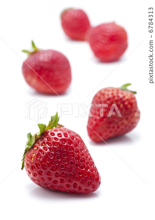 Multiple strawberries on white background 6784313