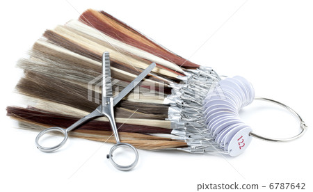 strands of hair with scissors 6787642