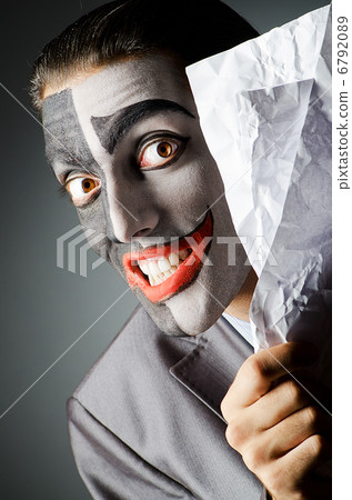 Businessman with clown face paint Businessman with clown face paint 6792089