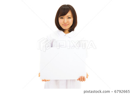 A nurse with a whiteboard A nurse with a whiteboard 6792665