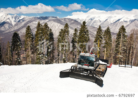 Snowplow, montains on background 6792697