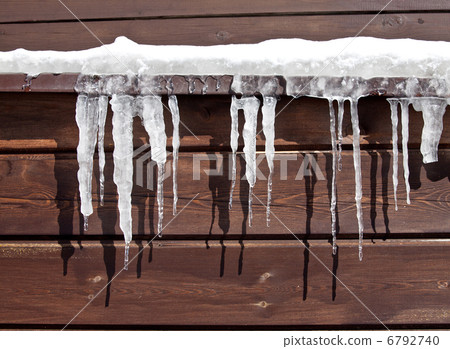Icicles on Log Cabin 6792740