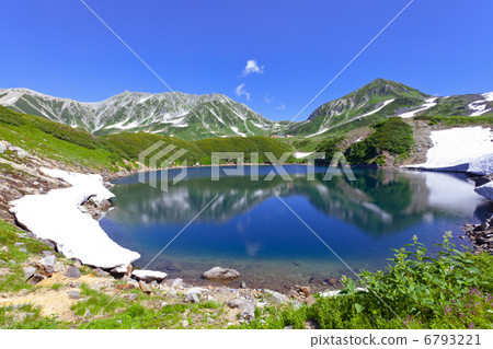 A summer mountain whose moon is reflected in a pond A summer mountain whose moon is reflected in a pond 6793221
