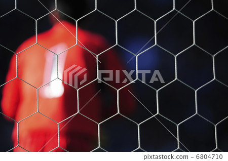 Goal nets and soccer players Goal nets and soccer players 6804710