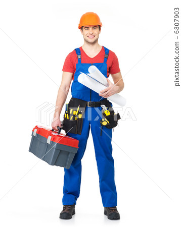 Smiling handyman with tools and paper Smiling handyman with tools and paper 6807903