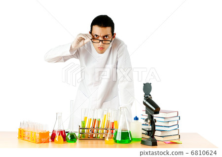 Chemist in the lab experimenting with solutions Chemist in the lab experimenting with solutions 6810624