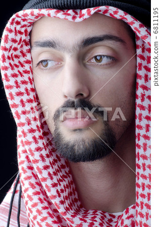 Man in arab clothing Man in arab clothing 6811195