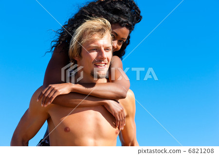 Couple in summer at the beach Couple in summer at the beach 6821208