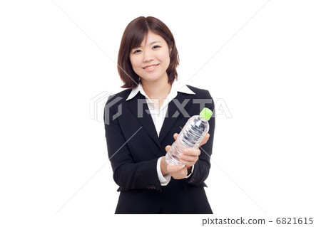 A woman holding a plastic bottle 6821615