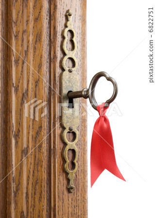 Antique key and ribbon Antique key and ribbon 6822751