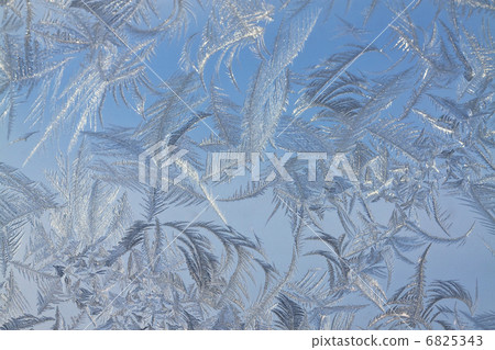 The abstract frosty pattern on glass 6825343