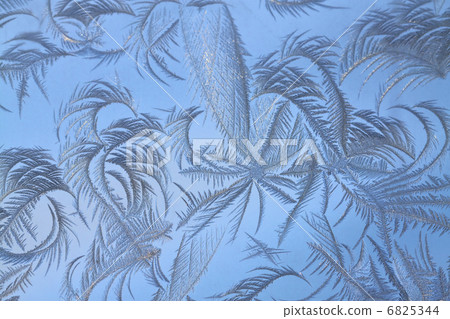 The abstract frosty pattern on glass The abstract frosty pattern on glass 6825344
