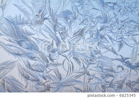 The abstract frosty pattern on glass 6825345