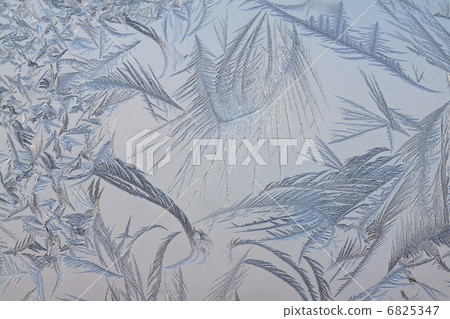 The abstract frosty pattern on glass The abstract frosty pattern on glass 6825347
