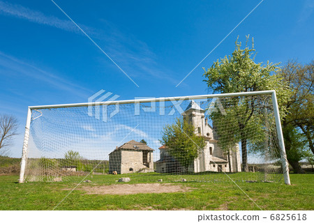 Old church and football goal (Sydoriv village, Ternopil region, Old church and football goal (Sydoriv village, Ternopil region, 6825618