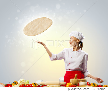 Asian female cook making pizza Asian female cook making pizza 6826984