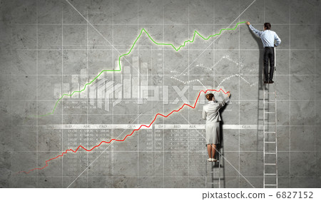 businesspeople drawing diagrams on wall businesspeople drawing diagrams on wall 6827152