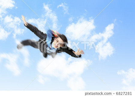 Young businessman flying with parachute on back 6827281