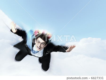Young businessman flying with parachute on back Young businessman flying with parachute on back 6827331