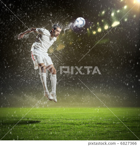 football player striking the ball football player striking the ball 6827366