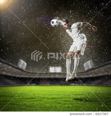 football player striking the ball football player striking the ball 6827367
