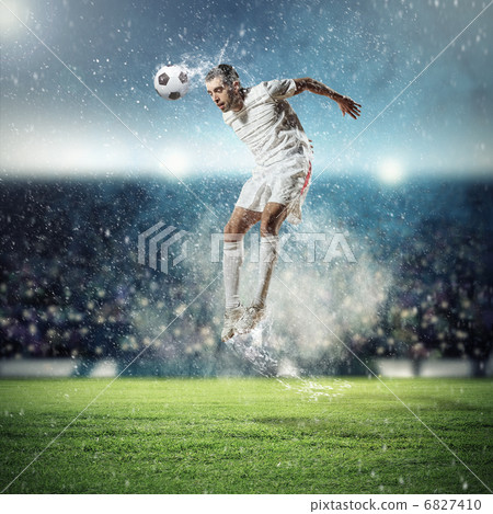 football player striking the ball 6827410