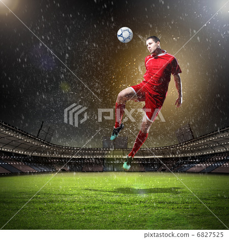 football player striking the ball football player striking the ball 6827525