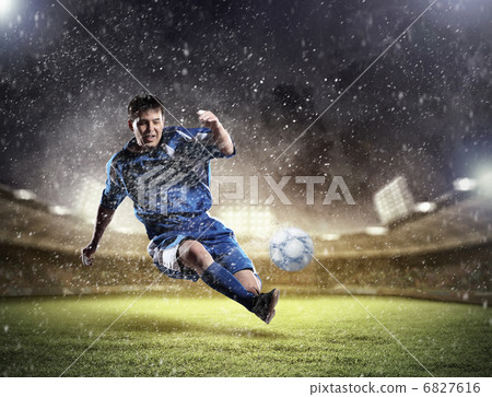 football player striking the ball 6827616
