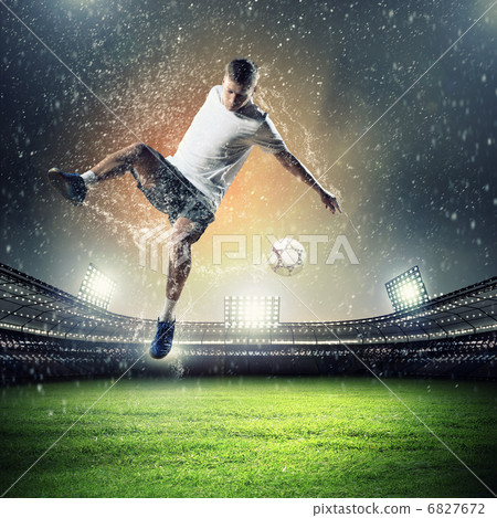 football player striking the ball football player striking the ball 6827672