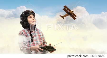 Little boy in pilots hat 6827821