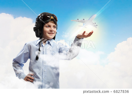 Little boy in pilots hat 6827836