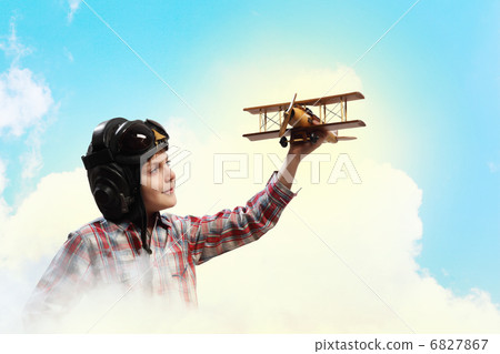 Little boy in pilots hat 6827867