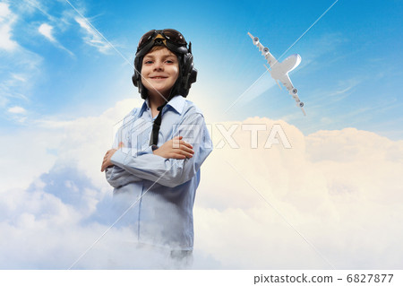 Little boy in pilots hat 6827877