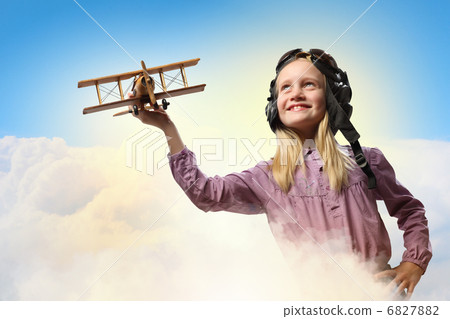 Little girl in pilots hat 6827882