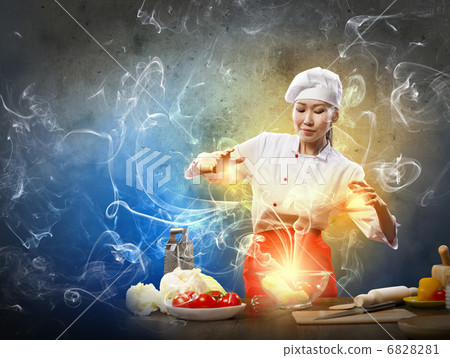 Asian female cooking with magic Asian female cooking with magic 6828281