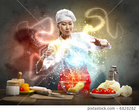 Asian female cooking with magic Asian female cooking with magic 6828282